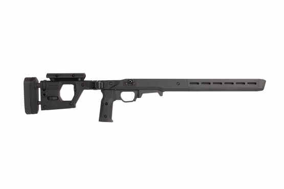Magpul black PRO 700 rifle chassis features adjustable comb and length of pull on the folding stock.